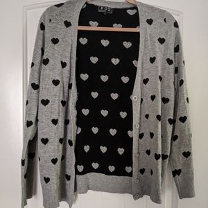 Grey sweater with black hearts